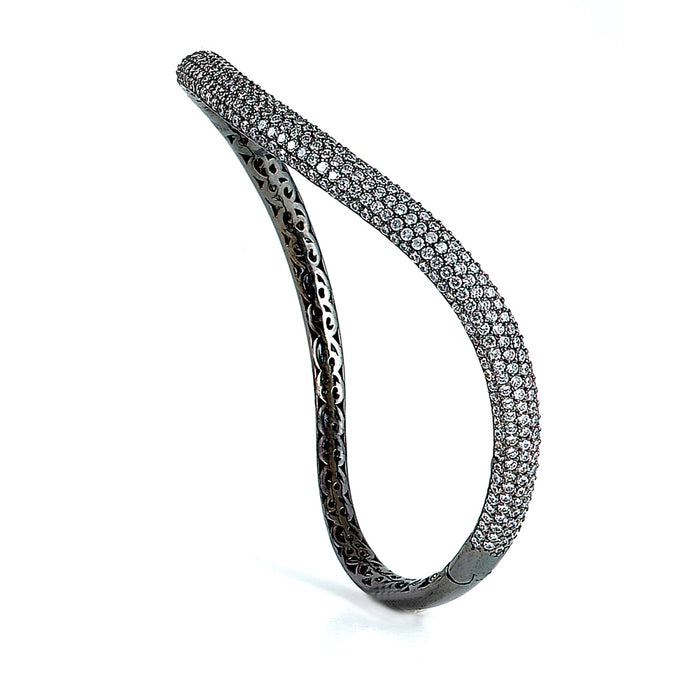 Sterling Silver Rhodium Plated and CZ micro-pave Curvy Bangle with safety clasp