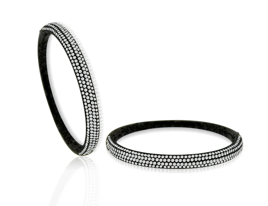 Sterling Silver Rhodium Plated and micro-pave CZ Bangle with safety clasp